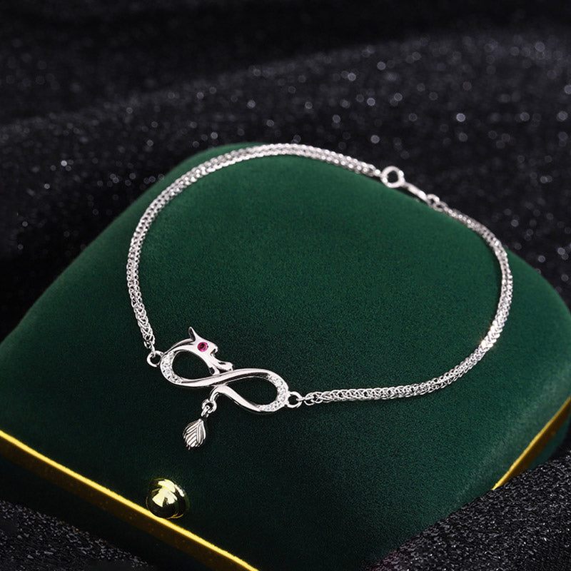 Drachenarmband aus 999er Sterlingsilber mit Zirkon-Endlosknoten-Anhänger