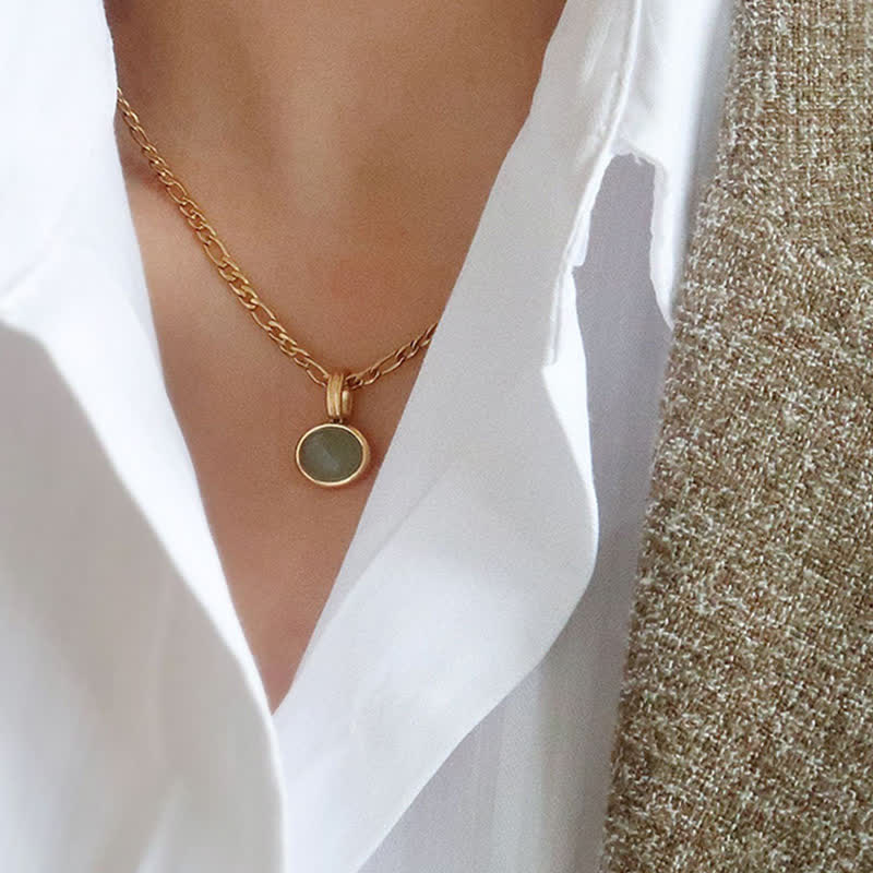 Türkisfarbener ovaler Kraft-Halskettenanhänger aus Titanstahl