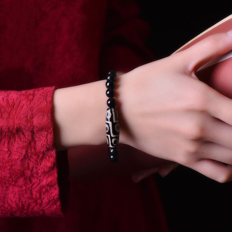 Natürliches Neun-Augen-Dzi-Perlenarmband für spirituellen Reichtum