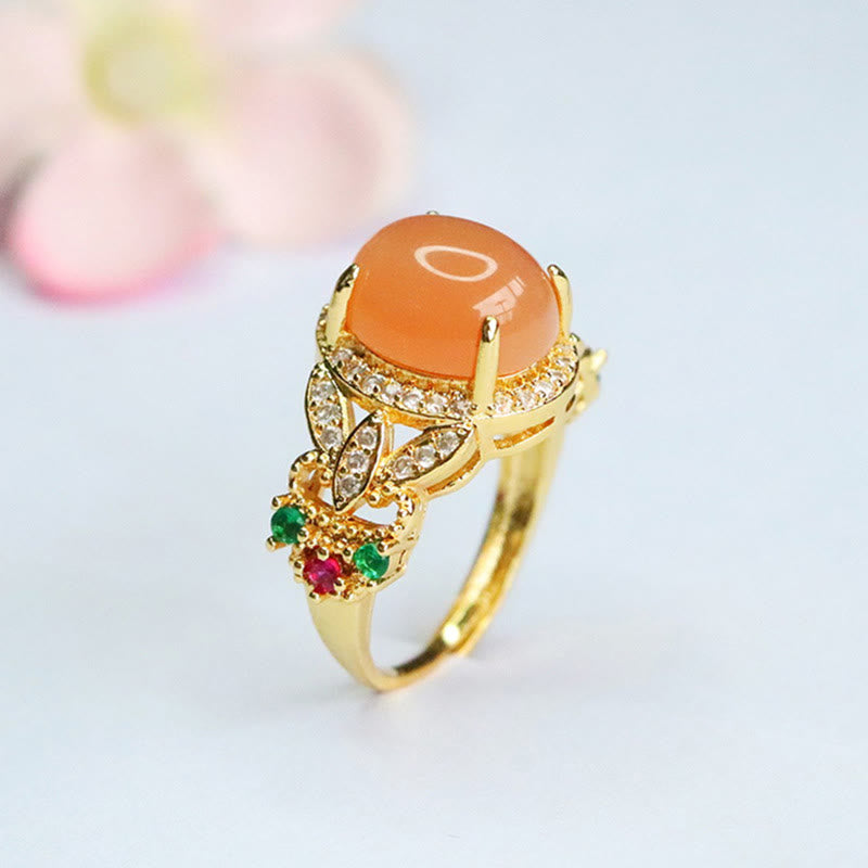 Verstellbarer Pfirsich-Mondstein-Ring mit vierblättrigem Blumendesign | Vintage