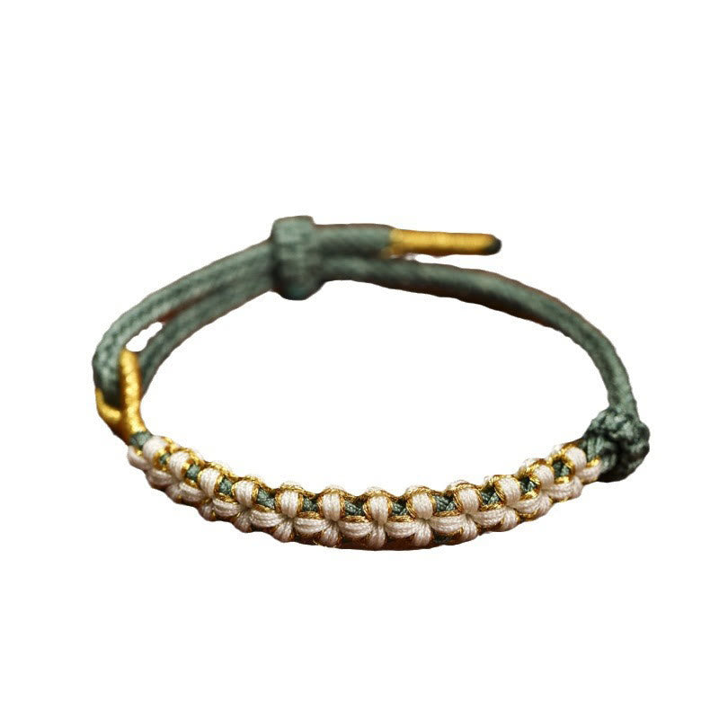 Verstellbares Armband aus rotem tibetischem Goldfaden mit Pfirsichblütenknoten