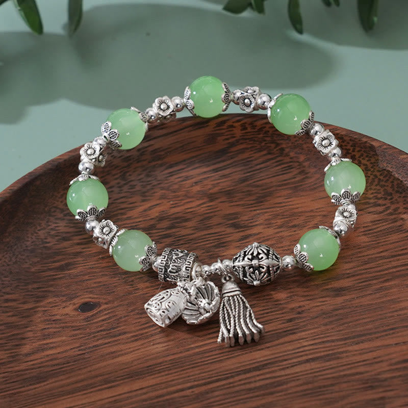 Lotusarmband mit Amethyst und mehreren Kristallen