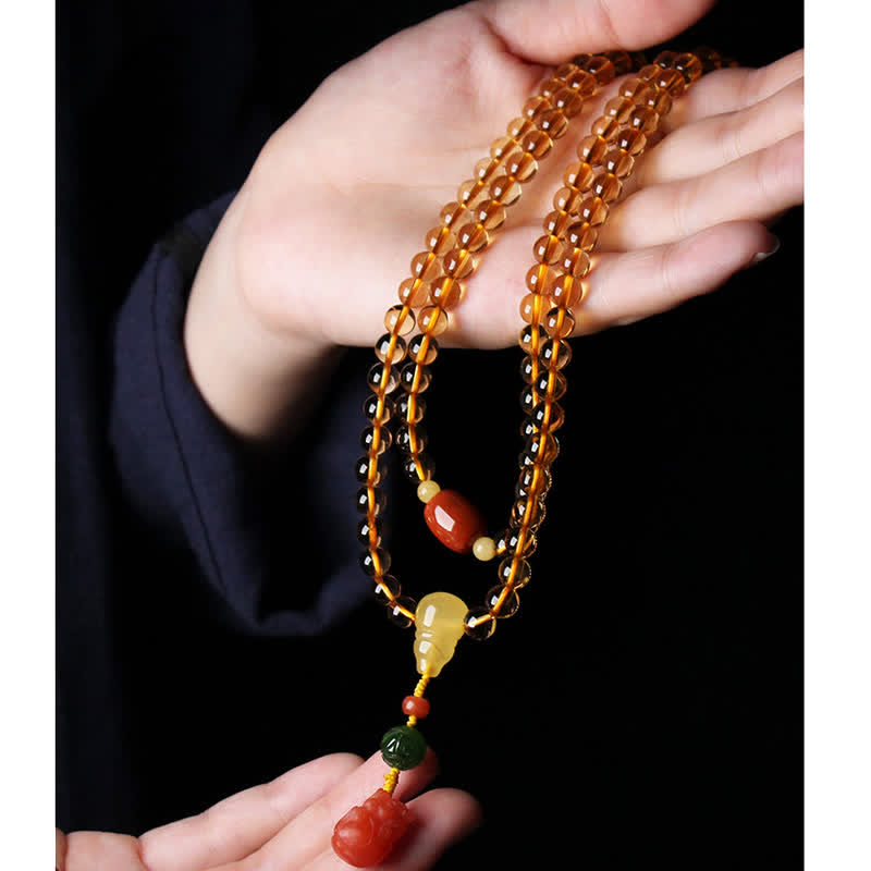 Mala-Armband mit 108 Perlen aus Citrin und Bernstein für den Frieden