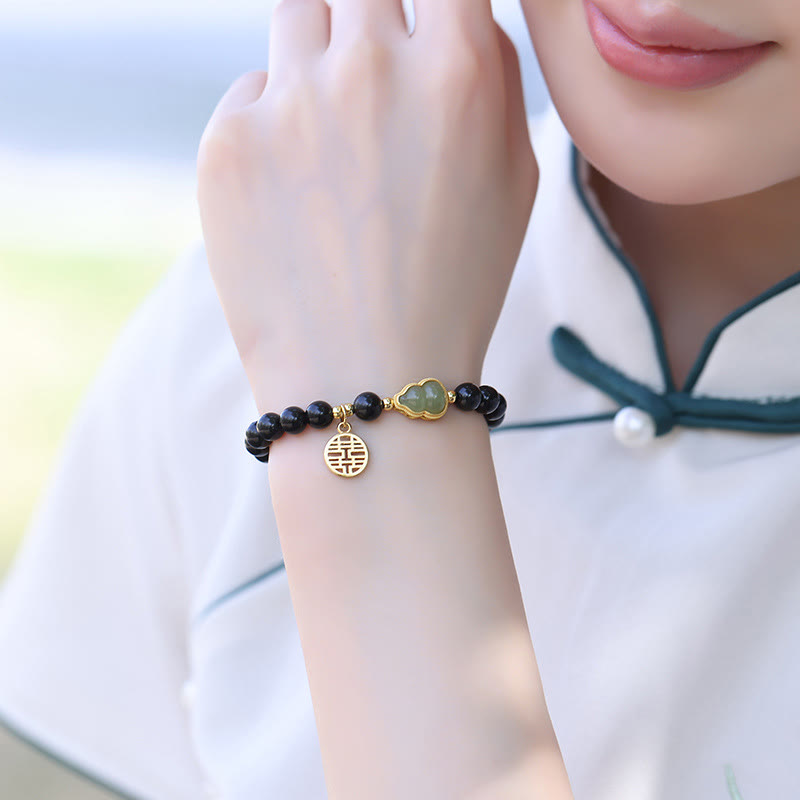 8 mm schwarzes Obsidian-Hetian-Jade-Stärkearmband