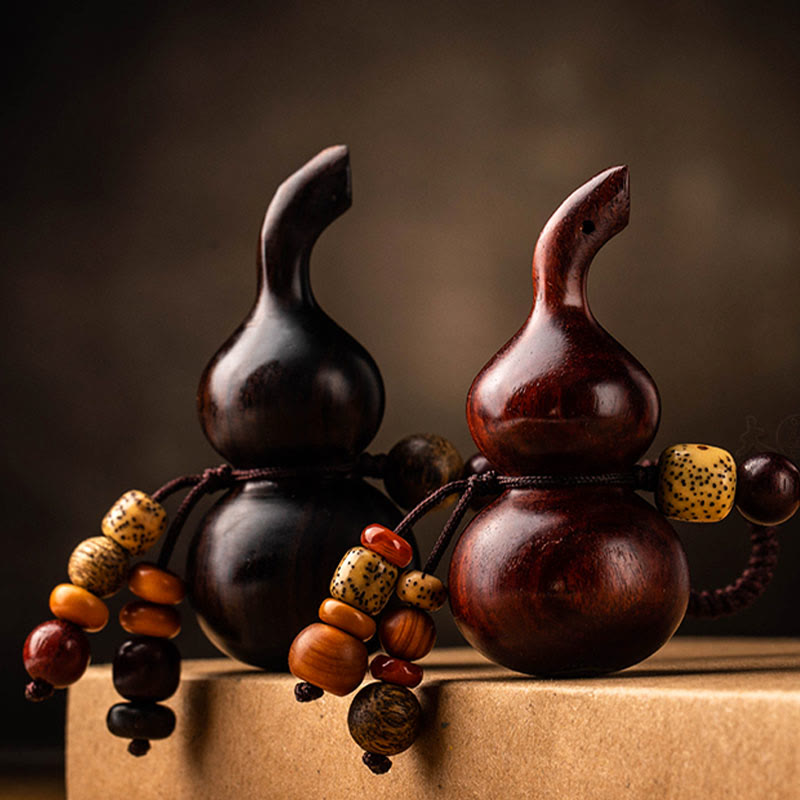 Schlüsselanhänger aus Kürbis aus Ebenholz und rotem Sandelholz für Glück und Schutz