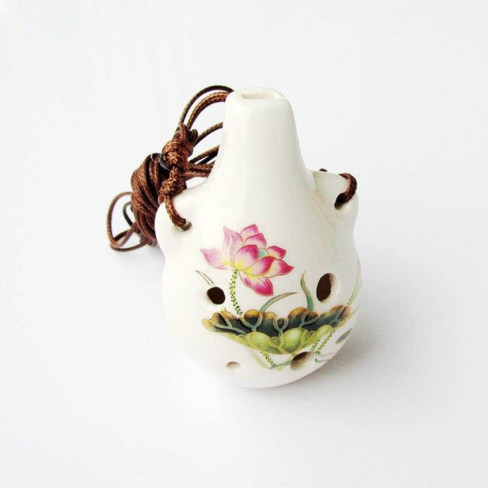 White ceramic 6-hole Alto C Ocarina Pendant with pink lotus flower design and brown cord