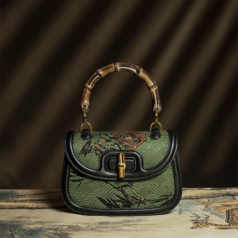 Schwarze Umhängetasche aus Xiangyunsha-Seide mit Bambusblume