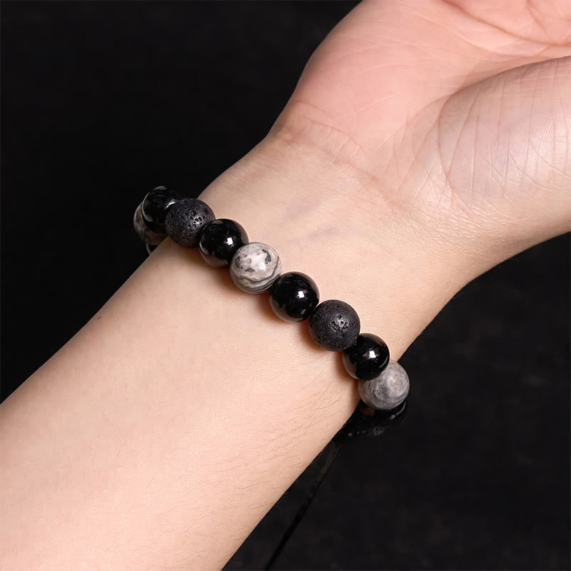 Schwarzes Obsidian-Lavastein-Yin-Yang-Armband für Stärke