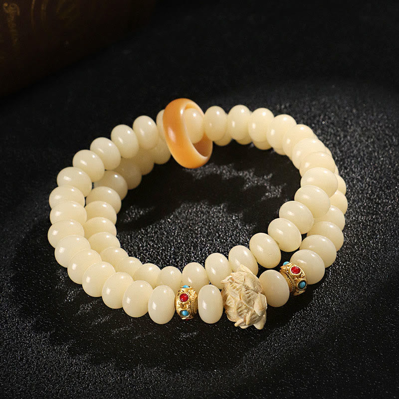 Bodhi Seed Pfirsichholz Lotus Reichtum Doppelwickelarmband