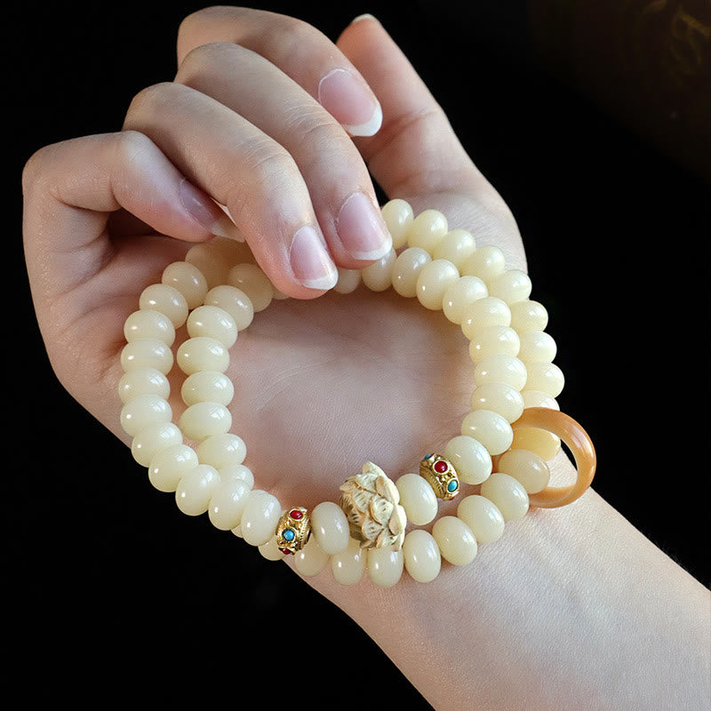 Bodhi Seed Pfirsichholz Lotus Reichtum Doppelwickelarmband