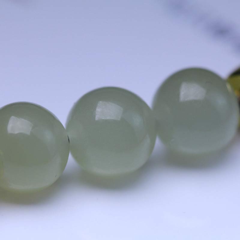 Verstellbares Jade-Lotussamen-Stärke-Armband mit roter Schnur