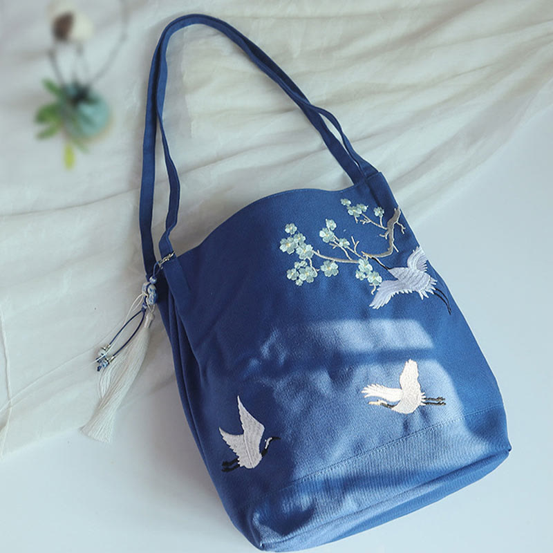 Canvas-Tragetasche mit Blumenkranich- und Pflaumenblüten-Stickerei