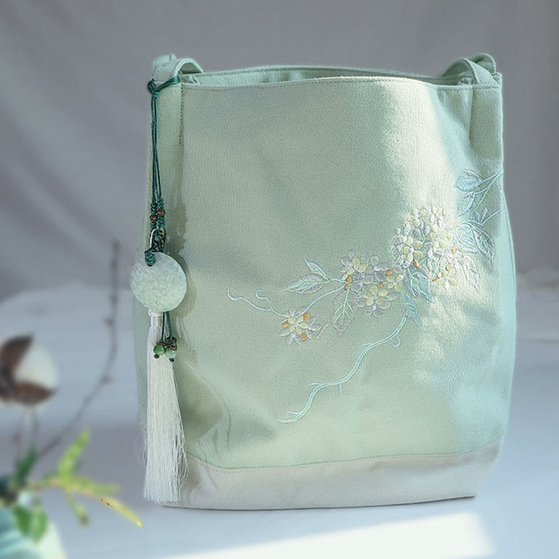 Canvas-Tragetasche mit Blumenkranich- und Pflaumenblüten-Stickerei