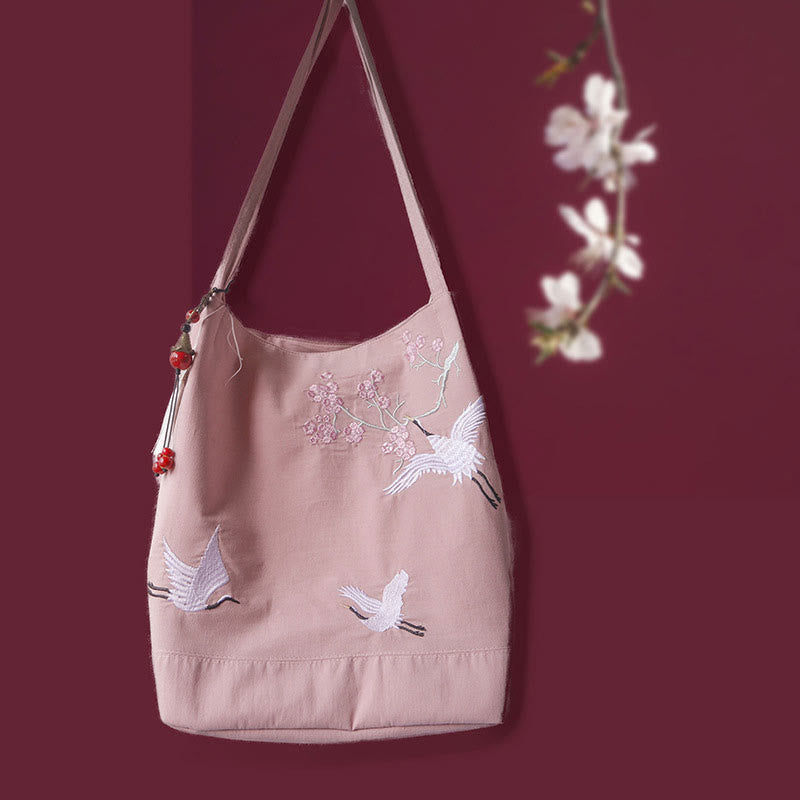 Canvas-Tragetasche mit Blumenkranich- und Pflaumenblüten-Stickerei