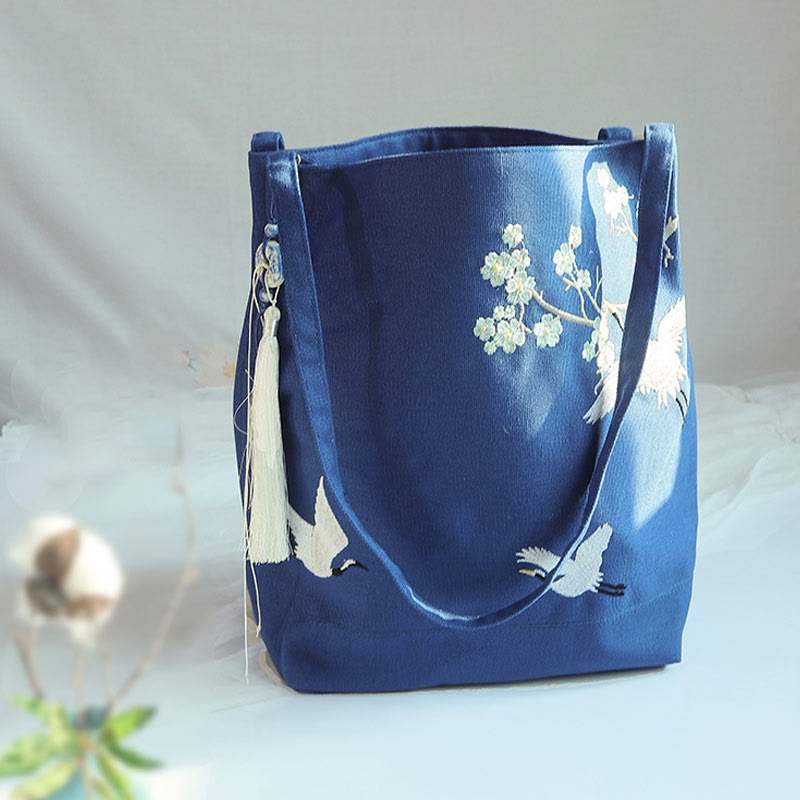 Canvas-Tragetasche mit Blumenkranich- und Pflaumenblüten-Stickerei