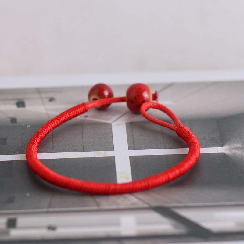 Verstellbares FengShui-Armband mit roter Schnur für Glück und Schutz