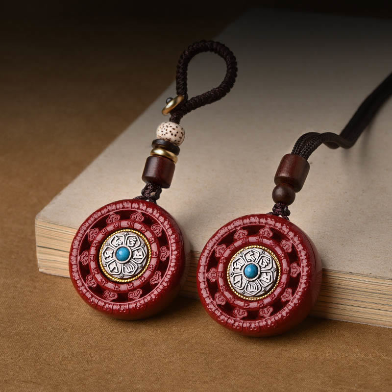 Zinnoberrote Halskette mit drehbarem Anhänger „Om Mani Padme Hum“ und Schlüsselanhänger