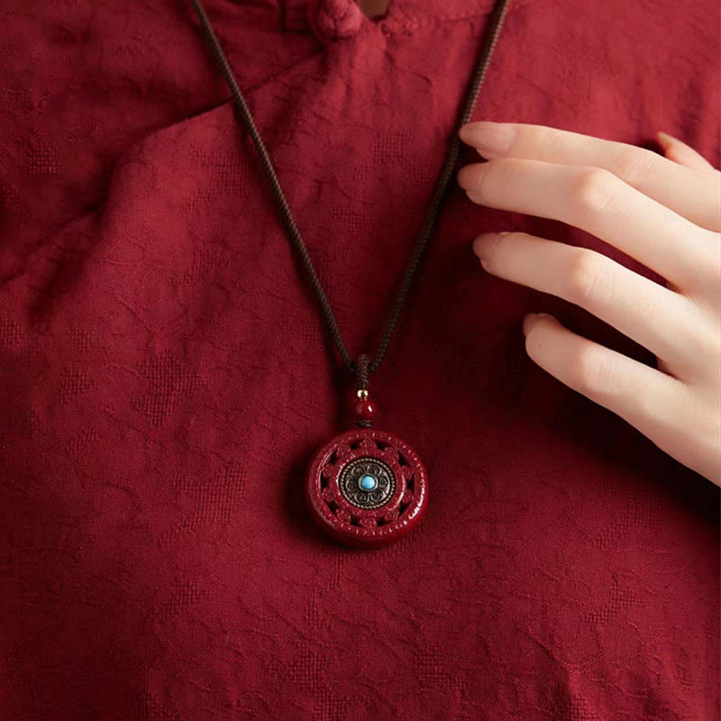 Zinnoberrote Halskette mit drehbarem Anhänger „Om Mani Padme Hum“ und Schlüsselanhänger