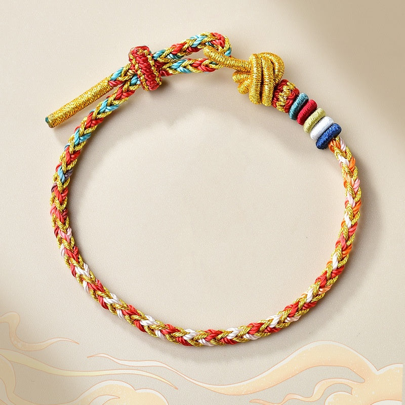 Buntes goldrotes Schnurarmband für Heilung und Gleichgewicht