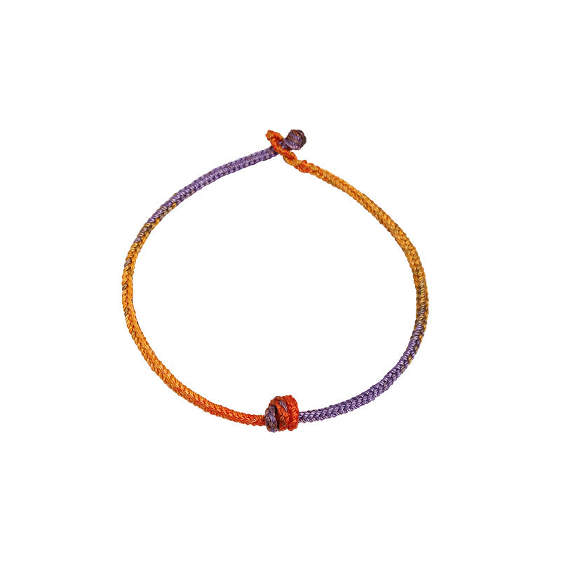 Buntes lila-goldrotes geflochtenes Seilarmband für Balance