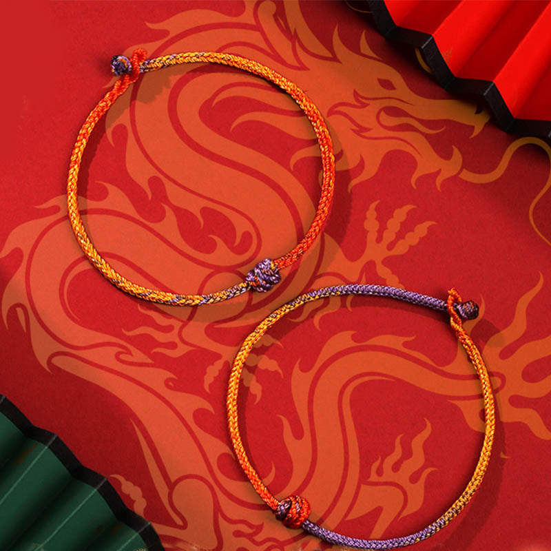 Buntes lila-goldrotes geflochtenes Seilarmband für Balance