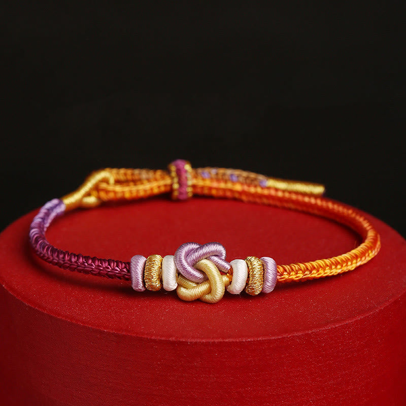 Buntes String-Herzknoten-Schutz-Spirituelles Armband verstellbar