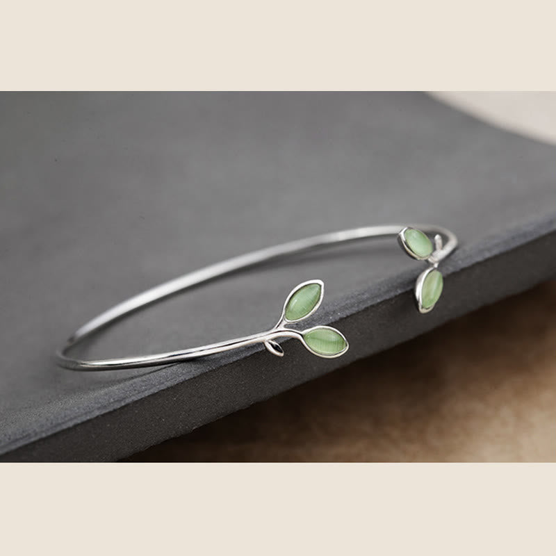 Kupfernes Manschettenarmband mit Katzenaugen-Blattmuster