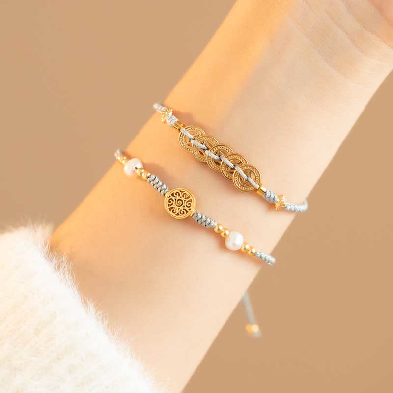 Kupfermünzen-Armband mit roter Schnur für Glück und Schutz