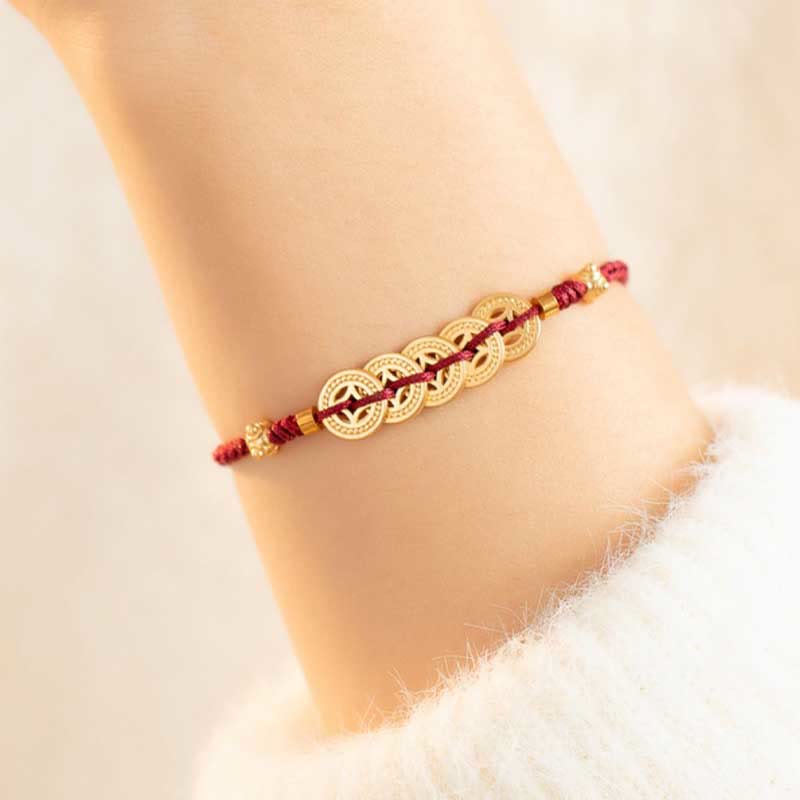 Kupfermünzen-Armband mit roter Schnur für Glück und Schutz