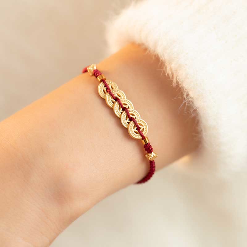 Kupfermünzen-Armband mit roter Schnur für Glück und Schutz