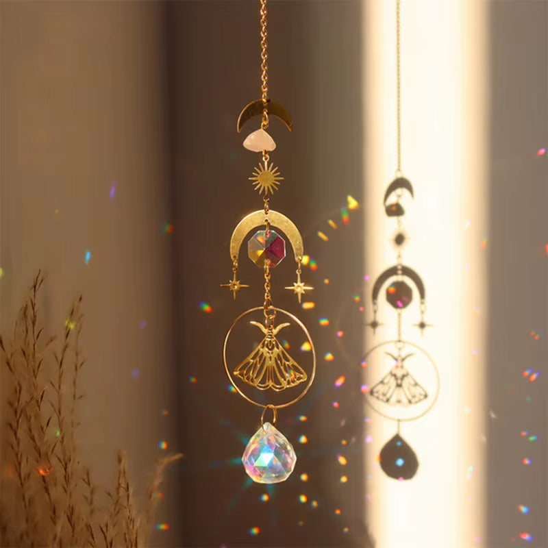 Golden celestial suncatcher with crystal prisms and moon phases for outdoor decor