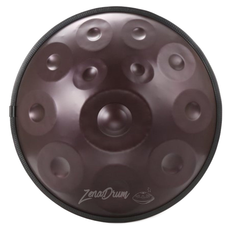 Dark metallic D Minor Kurd Handpan Drum with dimpled tone fields in circular pattern