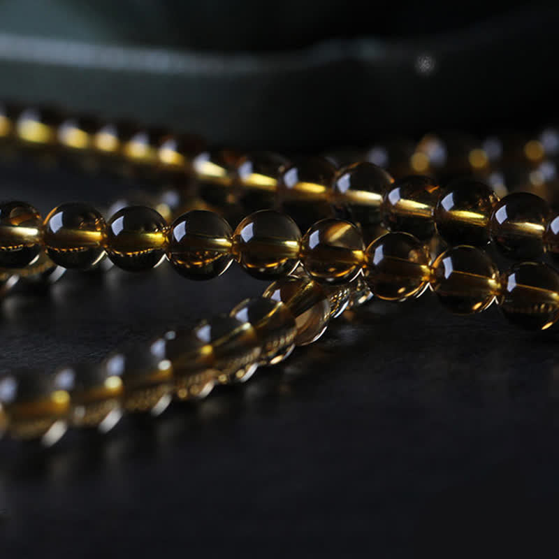 Mala-Armband mit 108 Perlen aus Citrin und Bernstein für den Frieden