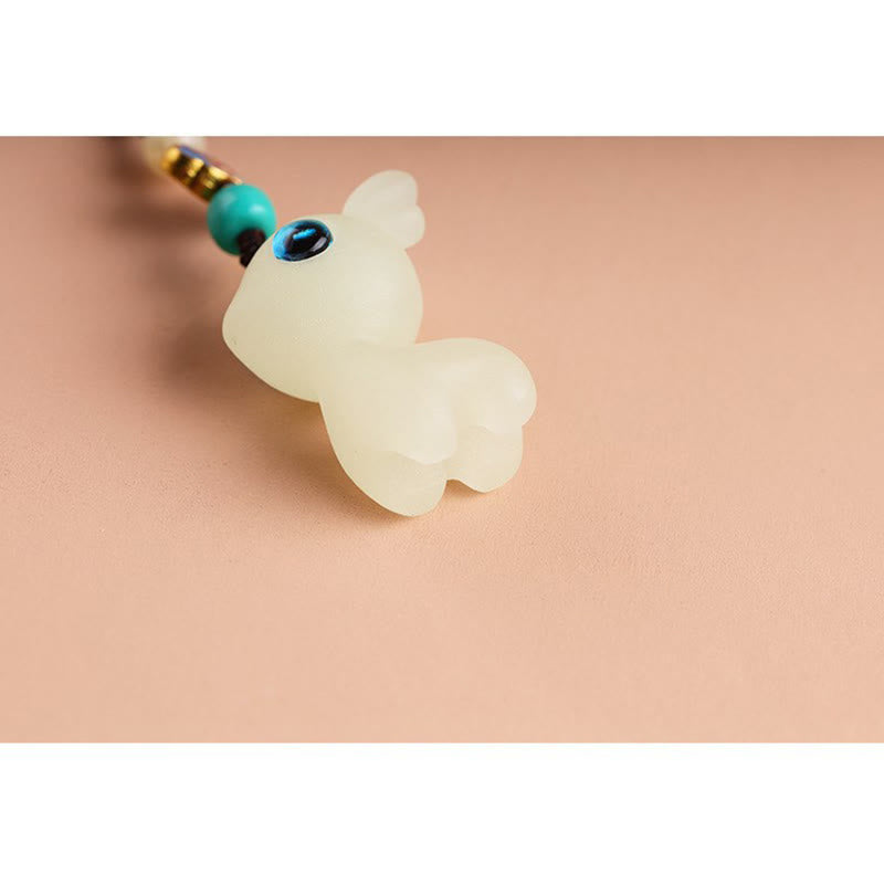 Schlüsselanhänger mit leuchtendem Hirsch-Glücksstein für spirituellen Schmucksegen