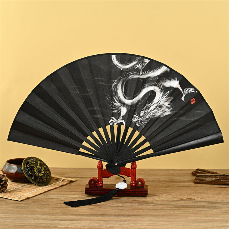 Faltfächer mit Drachen-, Phönix- und Tiger-Kranich-Motiv und Lotus-Quaste