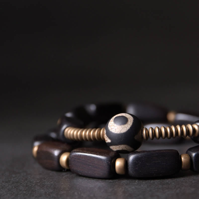 Doppelt gewickeltes Armband aus Ebenholz mit Dzi-Perlen für Balance
