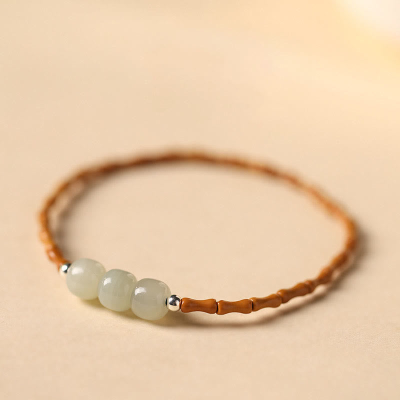 Glücksarmband aus Hetian-Jade und Olivenkern, 6 mm Perlen