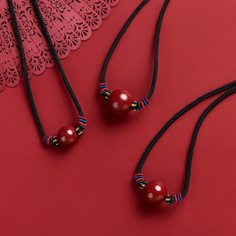 16 mm Halskette mit Segensanhänger aus Zinnoberperlen