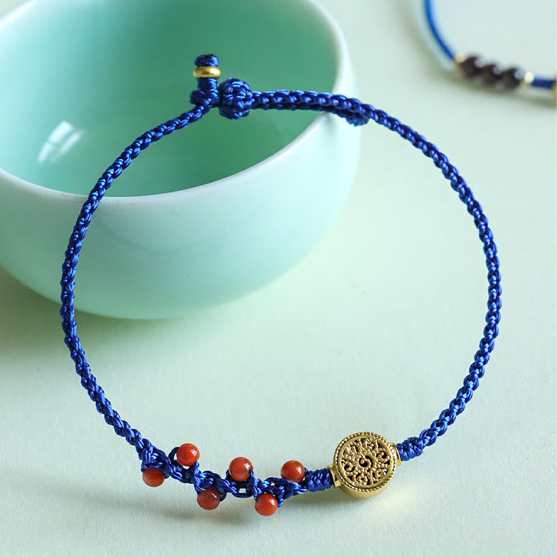 Granat-Kupfer-Blumenarmband an blauer Schnur | Heilende Klänge