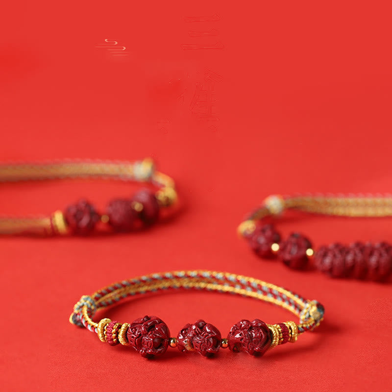 Handgefertigtes chinesisches Sternzeichen-Armband aus Zinnober mit dunkelrotem Segensband