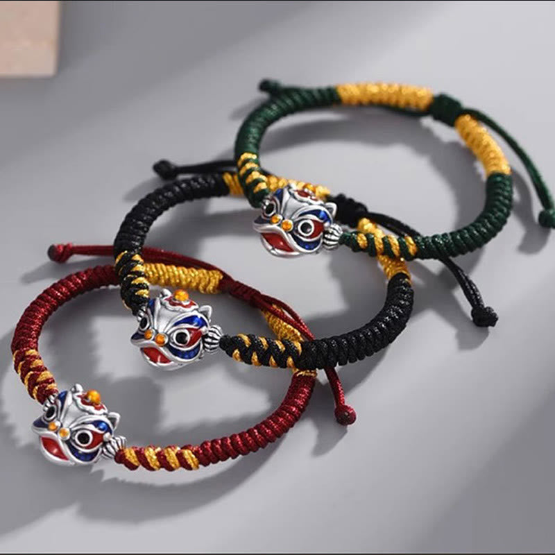 Handgemachtes tanzendes Löwenarmband mit roter Schnur zum Schutz