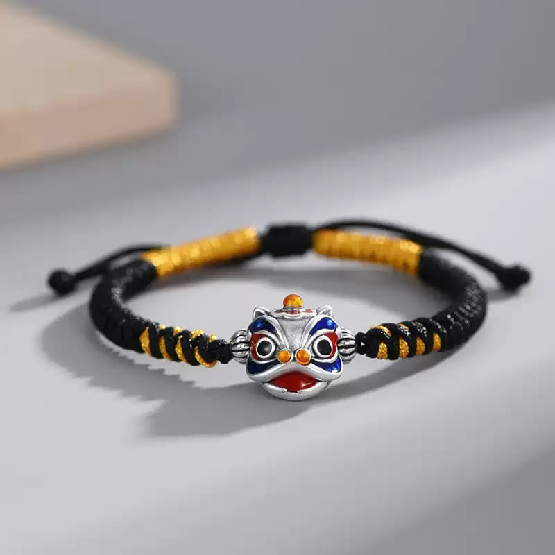 Handgemachtes tanzendes Löwenarmband mit roter Schnur zum Schutz