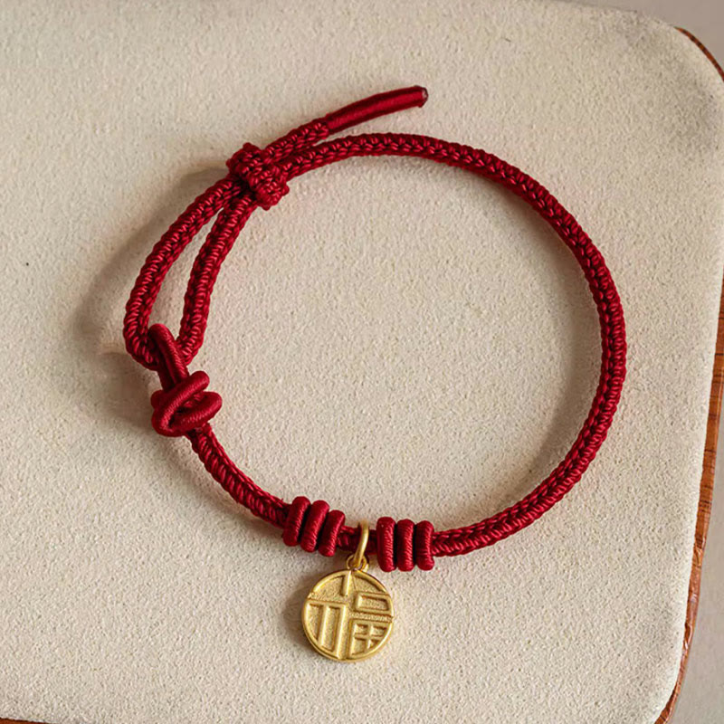 Handgefertigtes rotes Armband mit acht Fäden für Glück und Schutz