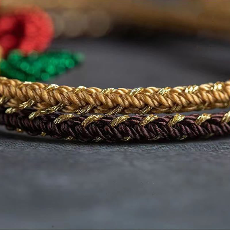 Handgefertigtes rotes Schnurarmband mit achtfädigem Friedensknoten für Glück