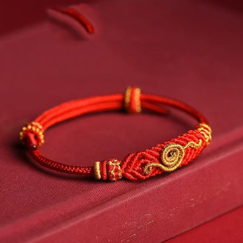 Handgemachtes rotes Armband mit acht Fäden, Friedensknoten und Schlangenjahr