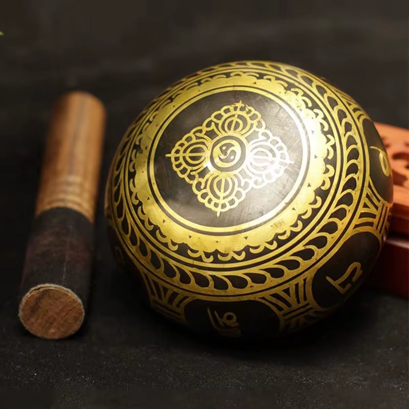 Decorative black and gold Handmade Tibetan Singing Bowl with mandala patterns