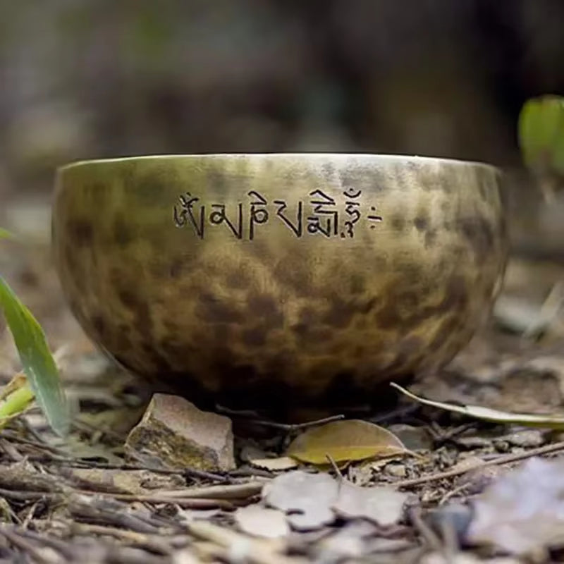 Handmade Tibetan Singing Bowl with engraved Sanskrit script for meditation and yoga
