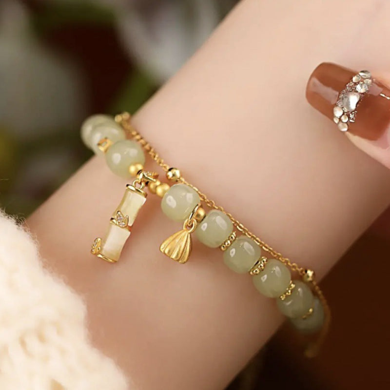 Hetian Jade Lotus Charm Armband für Wohlstand und Wachstum