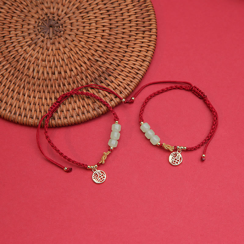Jadeperlenarmband mit Fu-Anhänger an rotem Seil für Glück und Wohlstand
