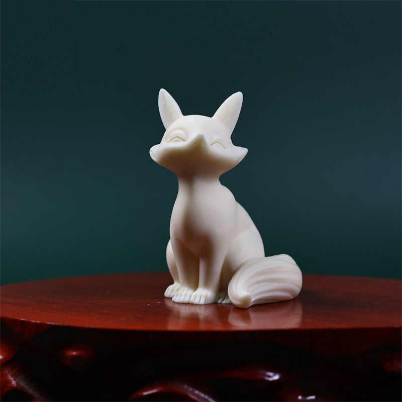 Mini-Schutzfigur aus Elfenbein-Obst mit neun Schwänzen